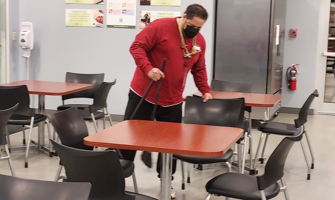 Man Cleaning Kitchen